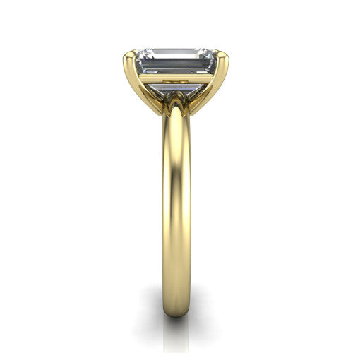 Noelle emerald classic solitaire engagement ring in 18K Yellow Gold, side profile showing the plain polished band and the prong setting in profile