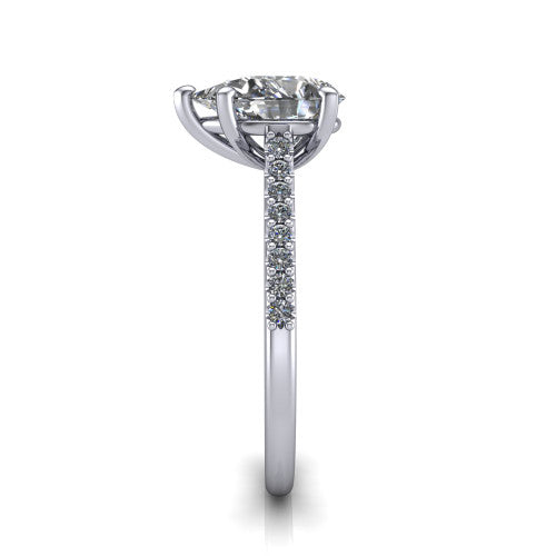 Milani pear-shaped classic engagement ring in Platinum, side profile showing the pavé shoulders and bow-motif gallery