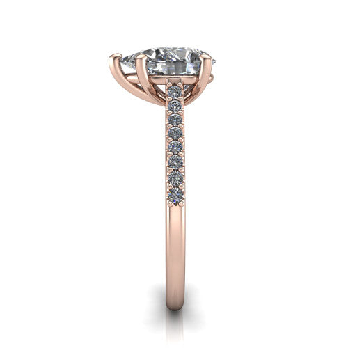Milani pear-shaped classic engagement ring in 14K Rose Gold, side profile showing the pavé shoulders and bow-motif gallery