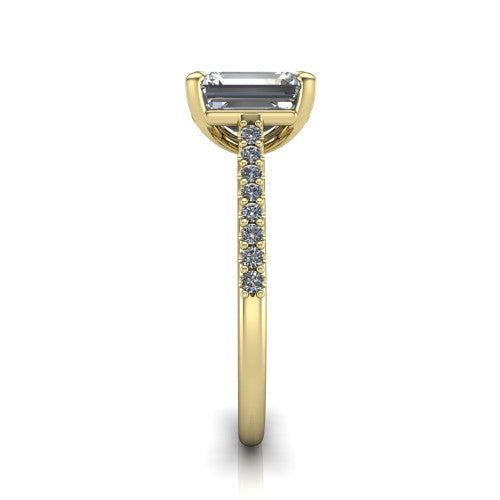 Milani emerald-cut classic engagement ring in 18K Yellow Gold, side profile showing the pavé shoulders and bow-motif gallery