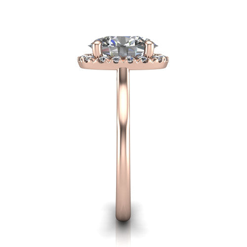 Gemma oval halo engagement ring in 18K Rose Gold, side profile showing the bow gallery and thin polished band in side view