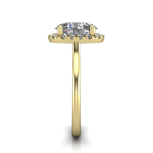Gemma oval halo engagement ring in 14K Yellow Gold, side profile showing the bow gallery and thin polished band in side view