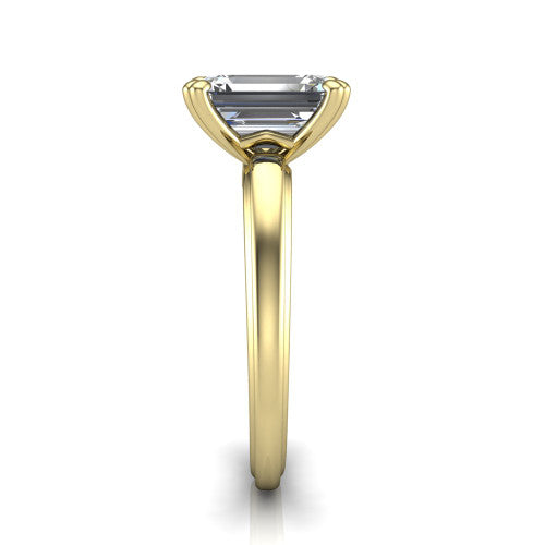 Erika emerald-cut classic engagement ring in 14K Yellow Gold, side profile showing the four-prong head and polished profile in side view