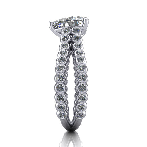 Magnolia heart classic engagement ring in 18K White Gold, side profile showing the split bezel-set diamond band in side view