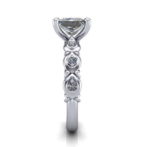 Nyla princess-cut solitaire engagement ring in Platinum, side profile showing the vintage station band in side view