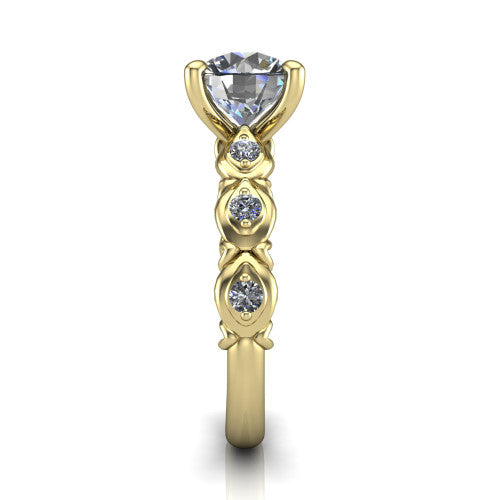 Nyla round solitaire engagement ring in 14K Yellow Gold, side profile showing the vintage station band in side view