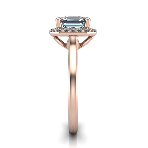 Dream square emerald halo engagement ring in 18K Rose Gold, side profile showing the cathedral shoulders and leaf-inspired basket gallery