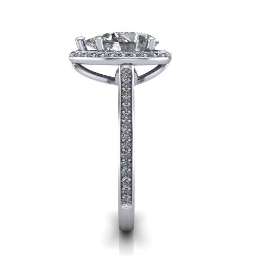 Delaney pear halo engagement ring in Platinum, side profile showing the leaf basket and pave band
