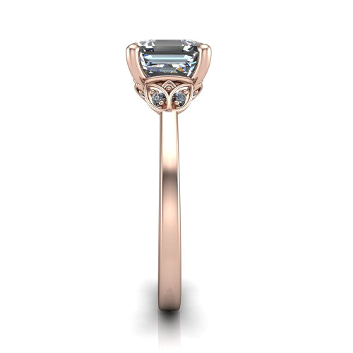 Lola square emerald solitaire engagement ring in 14K Rose Gold, side profile showing the petal basket and polished band