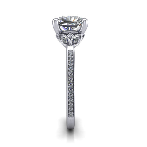 Lena cushion solitaire engagement ring in 18K White Gold, side profile showing the petal basket and pave band
