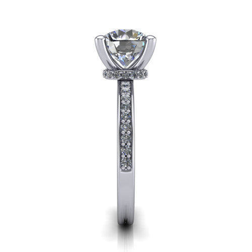 Renata round hidden halo engagement ring in Platinum, side profile showing the hidden pave halo and pave band