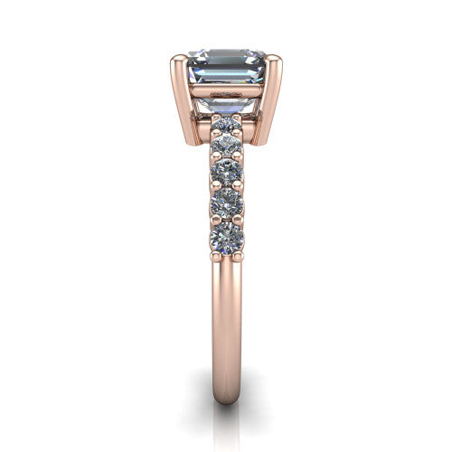 Fernanda square emerald solitaire engagement ring in 14K Rose Gold, side profile showing the 4-prong head and shared-prong pave band