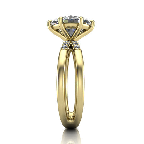 Raven oval solitaire engagement ring in 18K Yellow Gold, side profile showing the accent diamonds along the dual band