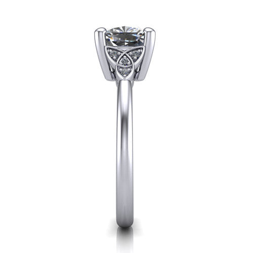 Lilith cushion solitaire engagement ring in Platinum, side profile showing the Celtic trinity knot accent and polished band