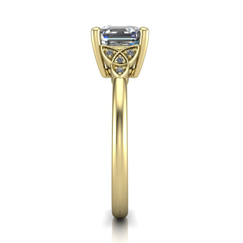 Lilith square emerald solitaire engagement ring in 14K Yellow Gold, side profile showing the Celtic trinity knot accent and polished band