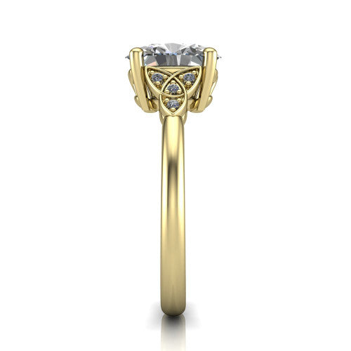 Lilith oval solitaire engagement ring in 14K Yellow Gold, side profile showing the Celtic trinity knot accent and polished band