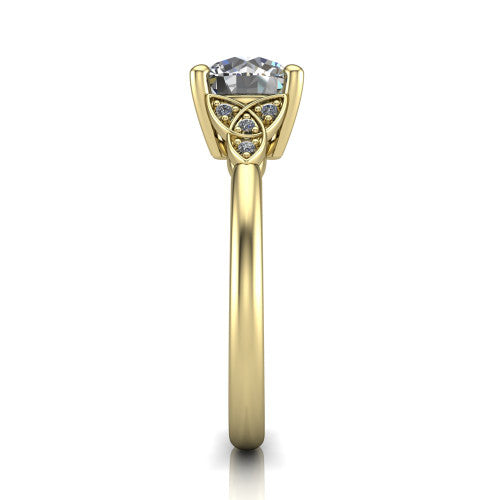 Lilith round solitaire engagement ring in 18K Yellow Gold, side profile showing the Celtic trinity knot accent and polished band