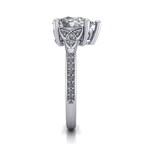 Samara pear-shaped Celtic engagement ring in Platinum, side profile showing the Celtic knot shoulder and pavé band