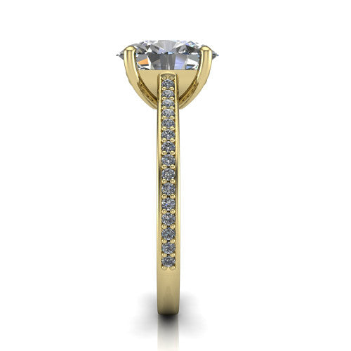 Nicole oval solitaire engagement ring in 18K Yellow Gold, side profile showing the vintage scrollwork engraving on the band