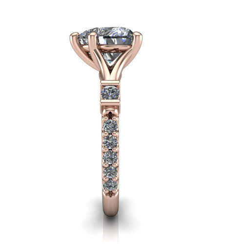 Arabella heart solitaire engagement ring in 18K Rose Gold, side profile showing the bezel-set square accents and pave band