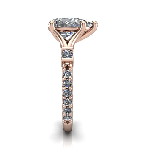 Arabella pear solitaire engagement ring in 14K Rose Gold, side profile showing the bezel-set square accents and pave band