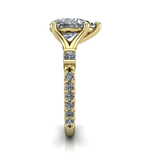 Arabella pear solitaire engagement ring in 18K Yellow Gold, side profile showing the bezel-set square accents and pave band