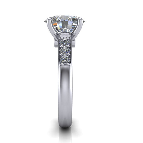 Nena oval solitaire engagement ring in 18K White Gold, side profile showing the channel-set shoulder diamonds