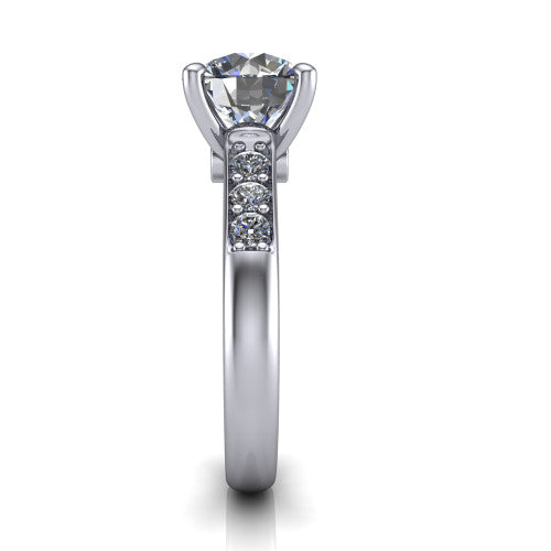 Nena round solitaire engagement ring in 14K White Gold, side profile showing the channel-set shoulder diamonds