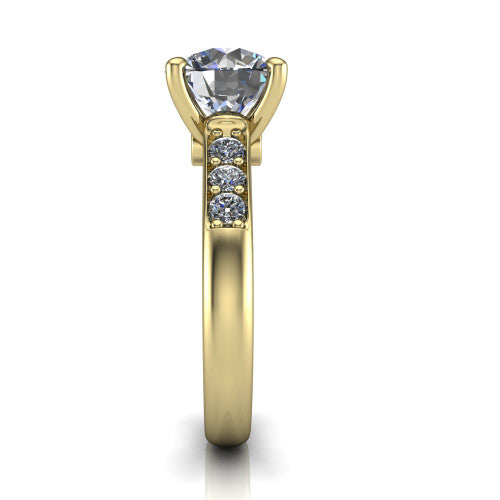 Nena round solitaire engagement ring in 14K Yellow Gold, side profile showing the channel-set shoulder diamonds