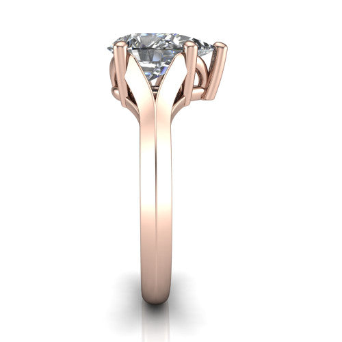 Joanna pear solitaire engagement ring in 14K Rose Gold, side profile showing the cathedral shank and polished band