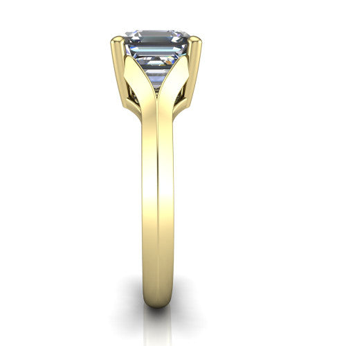 Joanna square emerald solitaire engagement ring in 14K Yellow Gold, side profile showing the cathedral shank and polished band
