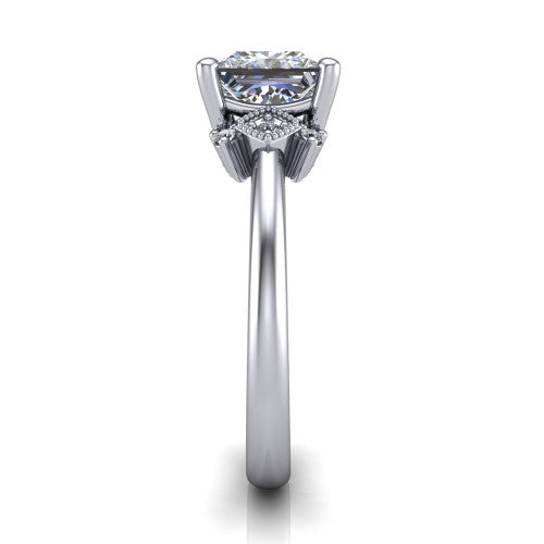 Harmony princess-cut three stone engagement ring in Platinum, side profile showing the diamond side clusters and polished band