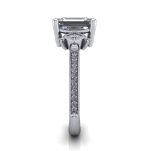 Presley emerald-cut three stone engagement ring in 14K White Gold, side profile showing the diamond side clusters and pavé band