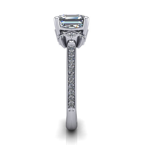 Presley square emerald-cut three stone engagement ring in 18K White Gold, side profile showing the diamond side clusters and pavé band
