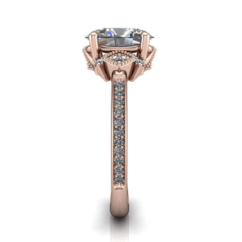 Presley oval three stone engagement ring in 14K Rose Gold, side profile showing the diamond side clusters and pavé band