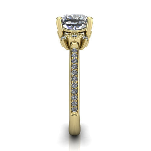 Presley cushion-cut three stone engagement ring in 14K Yellow Gold, side profile showing the diamond side clusters and pavé band