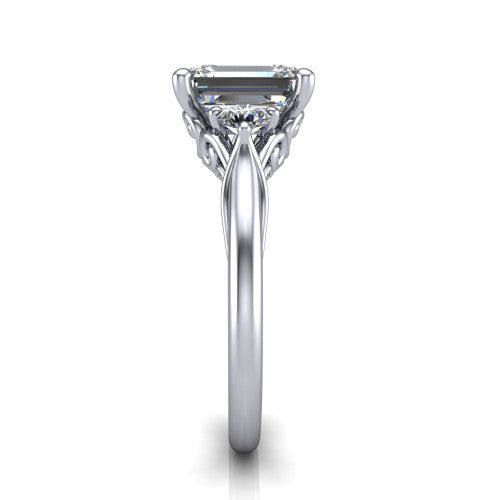 Harley emerald three stone engagement ring in 14K White Gold, side profile showing the filigree scroll gallery, tapered cathedral shoulders, and polished band