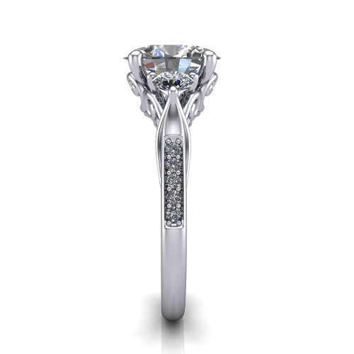 Celine oval three stone engagement ring in 18K White Gold, side profile showing the filigree gallery and pave diamond band along the shoulders