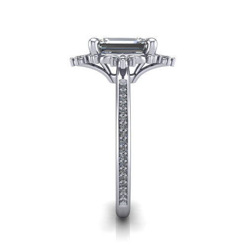 Jayla emerald solitaire engagement ring in Platinum, side profile showing the floral openwork frame and pave diamond band along the shoulders