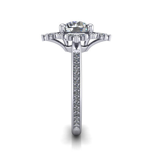 Jayla round solitaire engagement ring in Platinum, side profile showing the floral openwork frame and pave diamond band along the shoulders