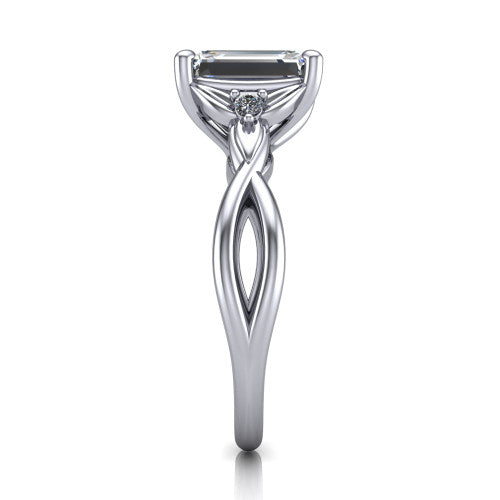 Catalina emerald three stone engagement ring in 14K White Gold, side profile showing the twisted infinity shank braiding beneath the head into a polished band
