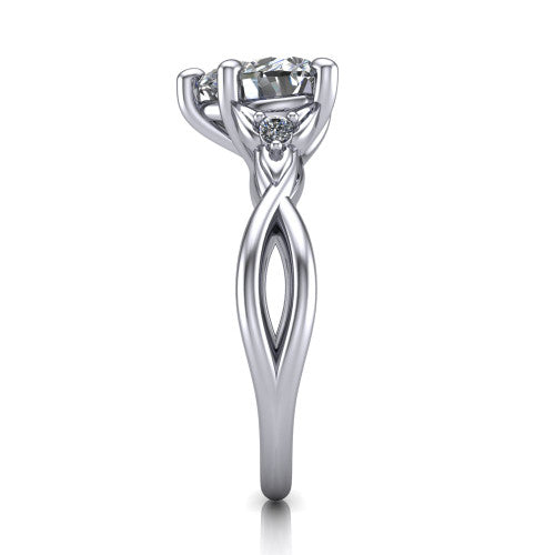 Catalina heart three stone engagement ring in 14K White Gold, side profile showing the twisted infinity shank braiding beneath the head into a polished band