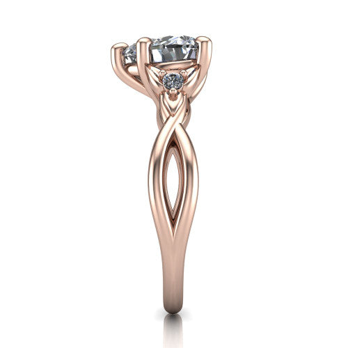Catalina heart three stone engagement ring in 18K Rose Gold, side profile showing the twisted infinity shank braiding beneath the head into a polished band