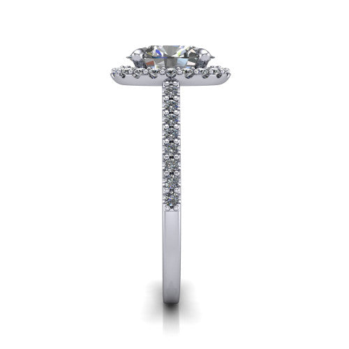 Birdie oval halo engagement ring in Platinum, side profile showing the pavé band and the filigree gallery in profile