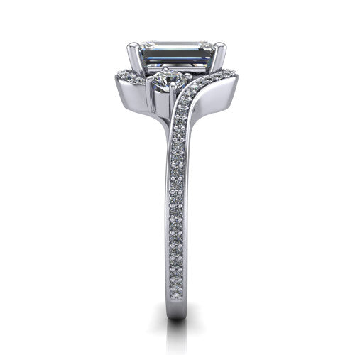 Sawyer emerald halo engagement ring in Platinum with squared pavé halo and bypass pavé shank, side profile showing the bypass pavé shank