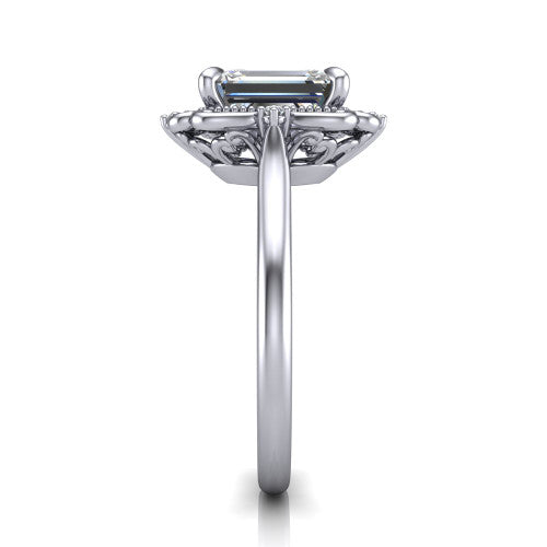 Gracelyn emerald halo engagement ring in 18K White Gold, side profile showing the carved scrollwork halo frame and the polished band