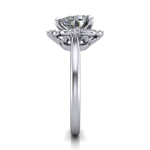 Gracelyn heart halo engagement ring in Platinum, side profile showing the carved scrollwork halo frame and the polished band