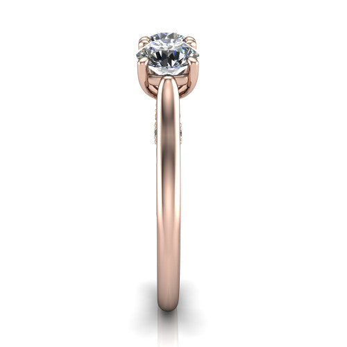 Kora round three-stone engagement ring in 14K Rose Gold, side profile showing the pave-set band, scrollwork gallery, and high-polish profile