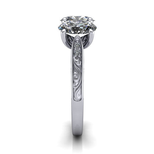 Navy oval three stone engagement ring in 14K White Gold, side profile showing the vintage engraved filigree band and the raised three-stone setting