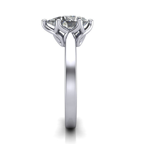 Alicia pear classic solitaire engagement ring in 18K White Gold, side profile showing the plain polished band and the filigree gallery in profile
